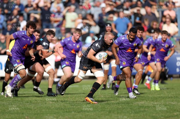 060925 - Ospreys v Exeter Chiefs - Pre Season Friendly - Huw Sutton of Ospreys makes a break