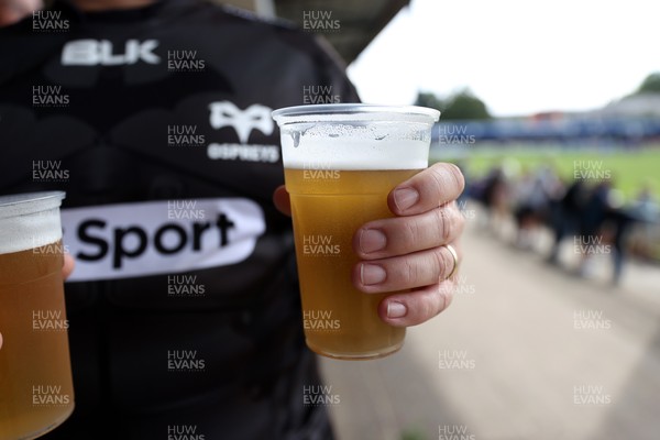 060925 - Ospreys v Exeter Chiefs - Pre Season Friendly - Fan holding beer