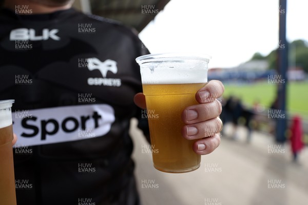 060925 - Ospreys v Exeter Chiefs - Pre Season Friendly - Fan holding beer
