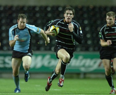 13.10.06  Ospreys v Gasgow  Ospreys James Hook leads an attack.  