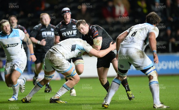 291113 - Ospreys v Glasgow - RaboDirect PRO12 -Morgan Allen of Ospreys takes on Jonny Gray of Glasgow