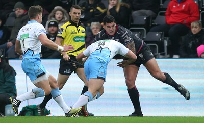 310116 - Ospreys v Glasgow - Guinness PRO12 - Josh Matavesi of Ospreys is tackled by Lee Jones of Glasgow