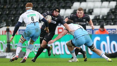 310116 - Ospreys v Glasgow - Guinness PRO12 - Nicky Smith of Ospreys is tackled by Greg Peterson of Glasgow