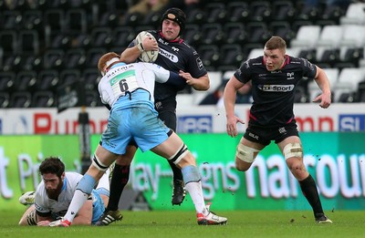 310116 - Ospreys v Glasgow - Guinness PRO12 - Nicky Smith of Ospreys is tackled by Rob Harley of Glasgow