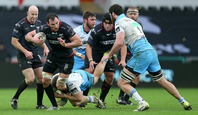 310116 - Ospreys v Glasgow - Guinness PRO12 - Joe Bearman of Ospreys is tackled by Pat MacArthur of Glasgow