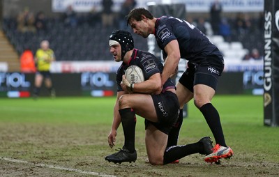 310116 - Ospreys v Glasgow - Guinness PRO12 - Dan Evans of Ospreys celebrates scoring a try