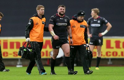 310116 - Ospreys v Glasgow - Guinness PRO12 - Sam Parry of Ospreys walks off the field with medics