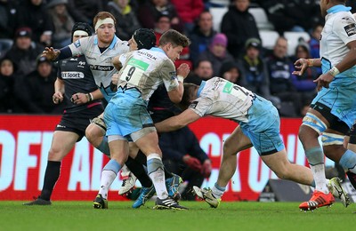 310116 - Ospreys v Glasgow - Guinness PRO12 - Sam Davies of Ospreys is tackled high by Grayson Hart of Glasgow