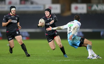 310116 - Ospreys v Glasgow - Guinness PRO12 - Sam Davies of Ospreys goes past Peter Murchie of Glasgow