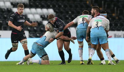 310116 - Ospreys v Glasgow - Guinness PRO12 - Scott Otten of Ospreys is tackled by Greg Peterson of Glasgow