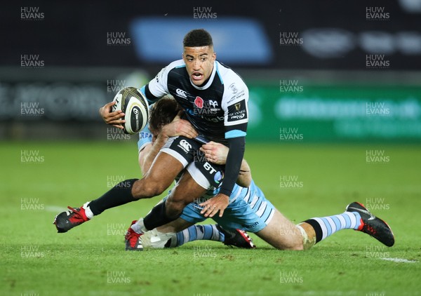 021118 - Ospreys v Glasgow Warriors, Guinness PRO14 - Keelan Giles of Ospreys is tackled by Stafford McDowall of Glasgow Warriors