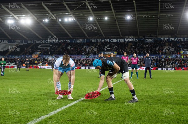 111123 - Ospreys v Glasgow Warriors - United Rugby Championship - Captains Richie Gray of Glasgow and Justin Tipuric of Ospreys lay wreaths for Remembrance