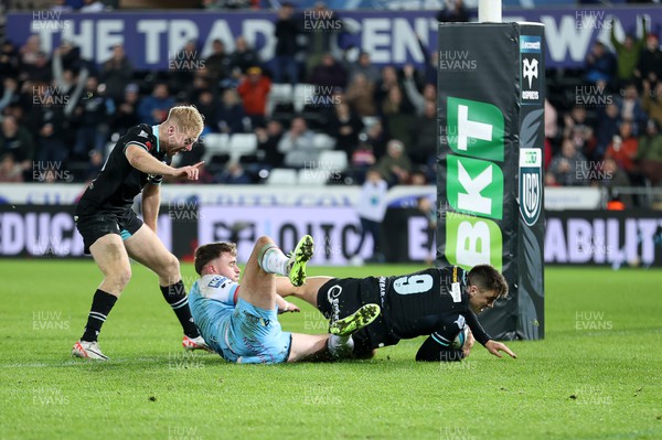 111123 - Ospreys v Glasgow Warriors - United Rugby Championship - Reuben Morgan-Williams of Ospreys runs in to score a try