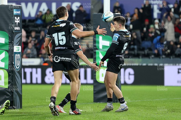111123 - Ospreys v Glasgow Warriors - United Rugby Championship - Reuben Morgan-Williams of Ospreys celebrates scoring a try with team mates