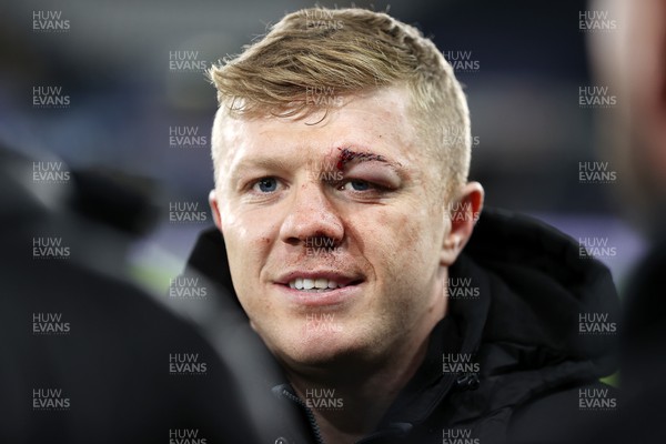 111123 - Ospreys v Glasgow Warriors - United Rugby Championship - Keiran Williams of Ospreys with a stitched up eye brow after the game