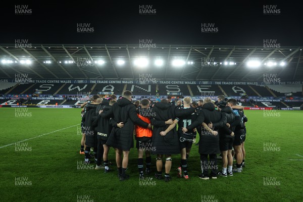 111123 - Ospreys v Glasgow Warriors - United Rugby Championship - Team huddle at full time