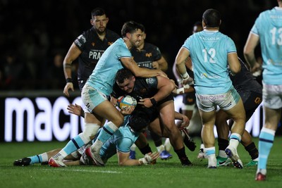 181025 - Ospreys v Glasgow Warriors - United Rugby Championship - Ben Warren of Ospreys is tackled by Adam Hastings of Glasgow 