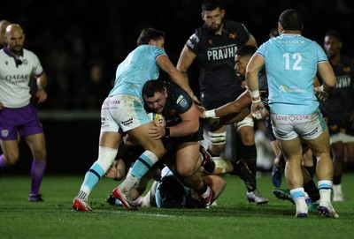 181025 - Ospreys v Glasgow Warriors - United Rugby Championship - Ben Warren of Ospreys is tackled by Adam Hastings of Glasgow 