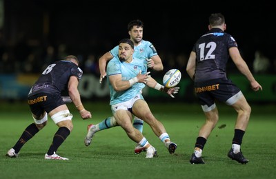 181025 - Ospreys v Glasgow Warriors - United Rugby Championship - Sione Tuipulotu of Glasgow is challenged by Ross Moriarty of Ospreys 