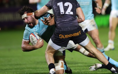 181025 - Ospreys v Glasgow Warriors, United Rugby Championship - Alex Samuel of Glasgow Warriors is tackled by Tom Florence of Ospreys