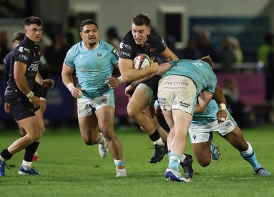 181025 - Ospreys v Glasgow Warriors, United Rugby Championship - Tom Florence of Ospreys is tackled