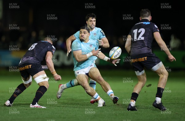 181025 - Ospreys v Glasgow Warriors - United Rugby Championship - Sione Tuipulotu of Glasgow is challenged by Ross Moriarty of Ospreys 