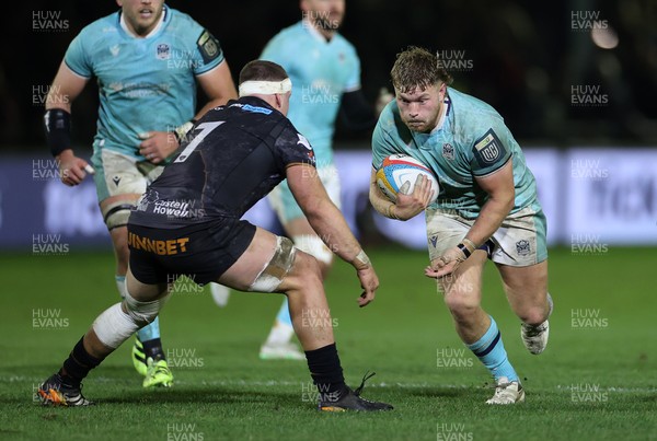 181025 - Ospreys v Glasgow Warriors - United Rugby Championship - Angus Fraser of Glasgow is tackled by Morgan Morse of Ospreys 