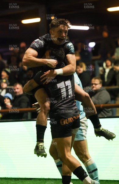 181025 - Ospreys v Glasgow Warriors, United Rugby Championship - Luke Morgan of Ospreys celebrates with Dan Edwards of Ospreys after Morgan dives in to score try