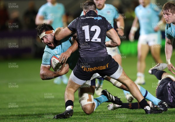 181025 - Ospreys v Glasgow Warriors, United Rugby Championship - Alex Samuel of Glasgow Warriors is tackled by Tom Florence of Ospreys