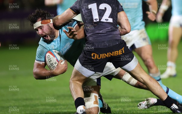 181025 - Ospreys v Glasgow Warriors, United Rugby Championship - Alex Samuel of Glasgow Warriors is tackled by Tom Florence of Ospreys