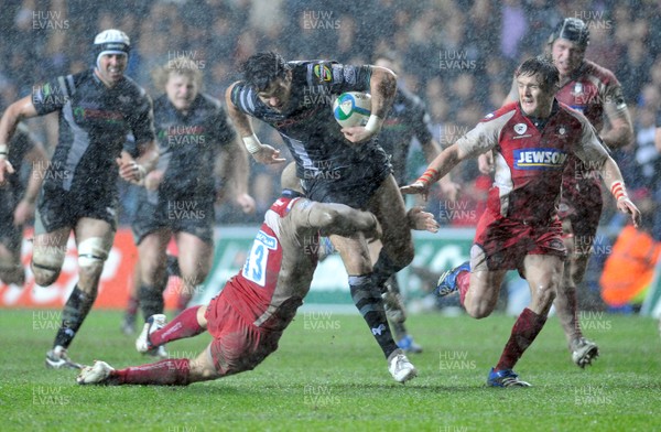 12.01.08 - Ospreys v Gloucester Heineken Cup Rugby Ospreys' Mike Phillips is tackled by Goucester's Mike Tindall 