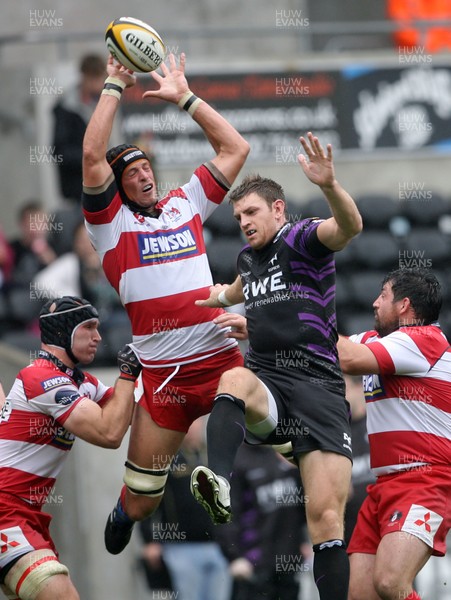 21.08.10. Ospreys v Gloucester... Glos' Alex Brown beats Nikki Walker to the ball. 