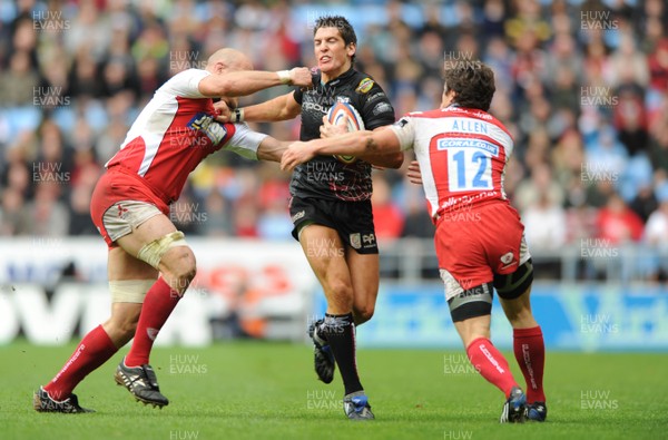 28.03.09 - Gloucester v Ospreys - EDF Energy Cup Semi Final 2009 - Ospreys James Hook is tackled by Will James and Anthony Allen. 