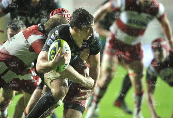 091112 - Ospreys v Gloucester Rugby  -  LV= Cup 2012/2013 -  Ospreys' Sam Lewis, is tackled by Glouceter's  Ross Moriaty    