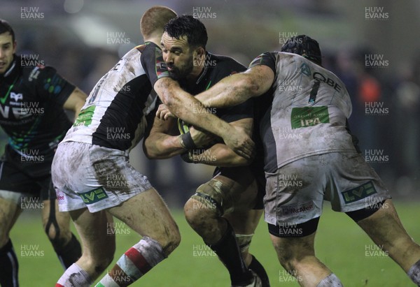 030213 - Ospreys v Harlequins, LV= Cup - Ospreys Jonathan Thomas takes on Harlequins' Rory Clegg and Harlequins' Mark Lambert