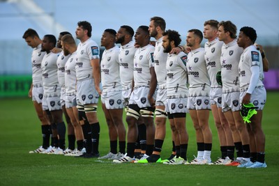 180426 - Ospreys v Hollywoodbets Sharks - United Rugby Championship - Hollywoodbets Sharks players during minute silence