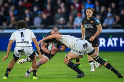 180426 - Ospreys v Hollywoodbets Sharks - United Rugby Championship - Sam Parry of Ospreys is tackled