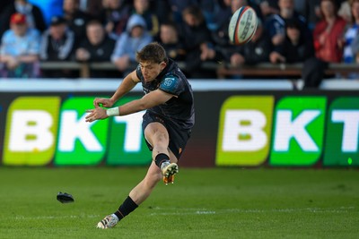 180426 - Ospreys v Hollywoodbets Sharks - United Rugby Championship - Dan Edwards of Ospreys kicks a conversion