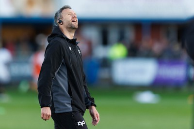 180426 - Ospreys v Hollywoodbets Sharks - United Rugby Championship - Ospreys head coach Mark Jones during the warm up