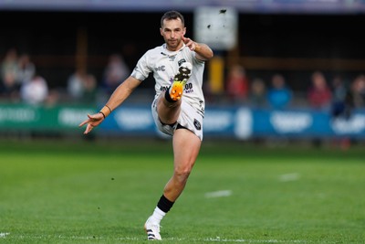 180426 - Ospreys v Hollywoodbets Sharks - United Rugby Championship - Jean Smith of Sharks kicks the ball
