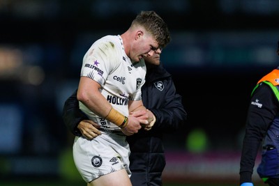 180426 - Ospreys v Hollywoodbets Sharks - United Rugby Championship - Ethan Hooker of Sharks is led from the field with an injury after scoring a try