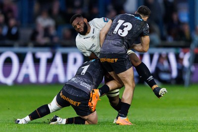 180426 - Ospreys v Hollywoodbets Sharks - United Rugby Championship - Vincent Tshituka of Sharks is tackled by Jac Morgan of Ospreys