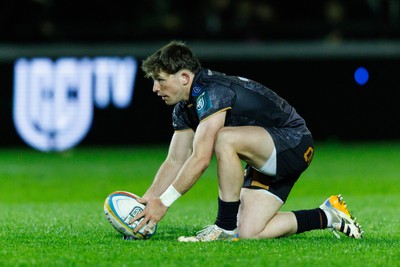 180426 - Ospreys v Hollywoodbets Sharks - United Rugby Championship - Dan Edwards of Ospreys prepares to kick a conversion
