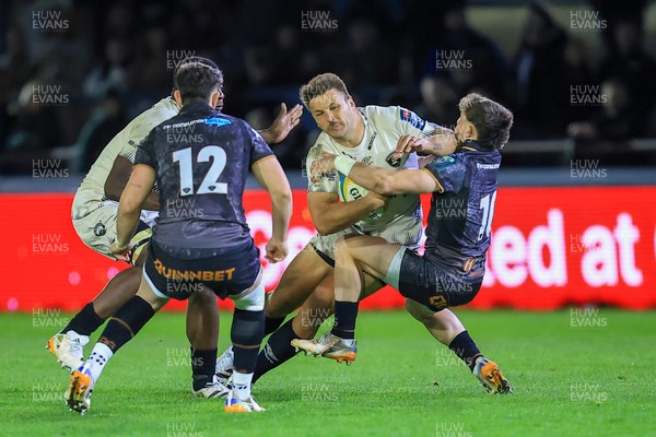 180426 - Ospreys v Hollywoodbets Sharks - United Rugby Championship - Jean Smith of Hollywoodbets Sharks is tackled by  Dan Edwards of Ospreys