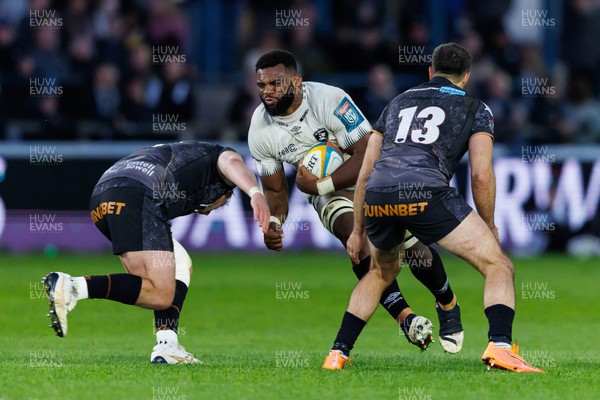 180426 - Ospreys v Hollywoodbets Sharks - United Rugby Championship - Vincent Tshituka of Sharks is tackled by Jac Morgan of Ospreys