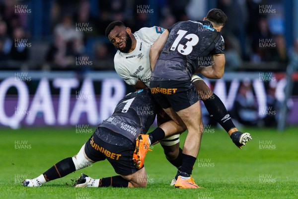 180426 - Ospreys v Hollywoodbets Sharks - United Rugby Championship - Vincent Tshituka of Sharks is tackled by Jac Morgan of Ospreys