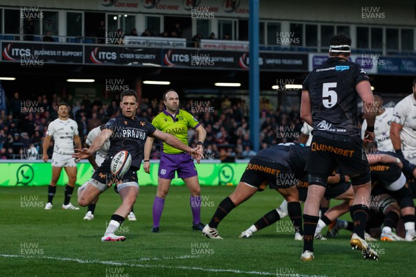 180426 - Ospreys v Hollywoodbets Sharks - United Rugby Championship - Kieran Hardy of Ospreys kicks the ball