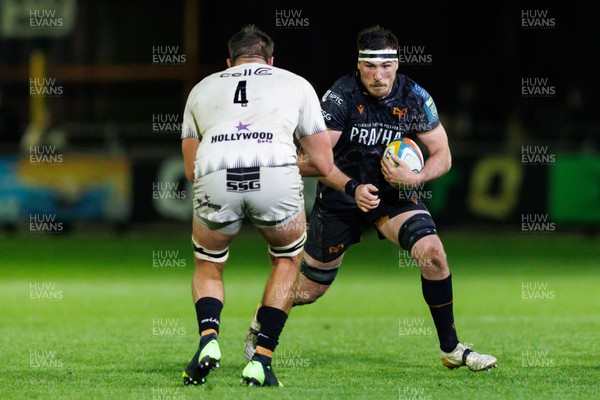 180426 - Ospreys v Hollywoodbets Sharks - United Rugby Championship - Ryan Smith of Ospreys takes on Jason Jenkins of Sharks