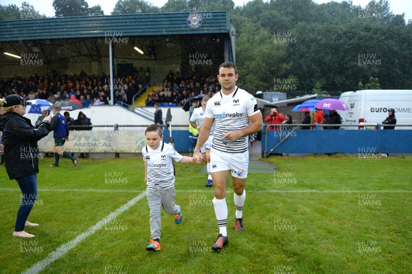 110817 - Ospreys v Leicester - Preseason Friendly - Tom Habberfield of Ospreys leads out his side with mascot