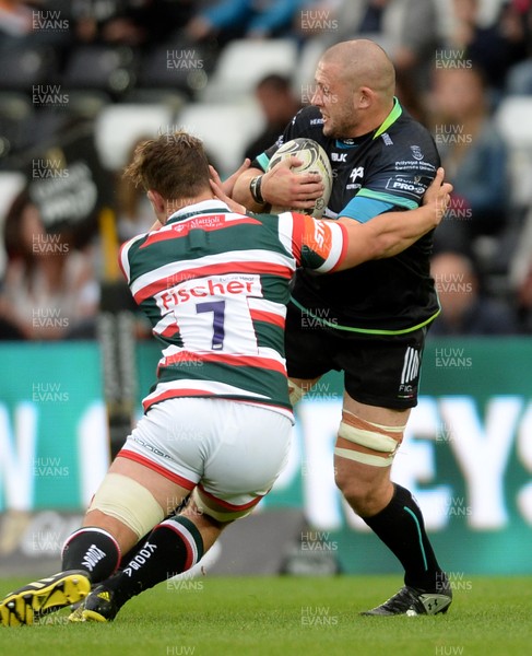 120816 - Ospreys v Leicester - Preseason Friendly -Scott Otten of Ospreys is tackled by Will Evans of Leicester